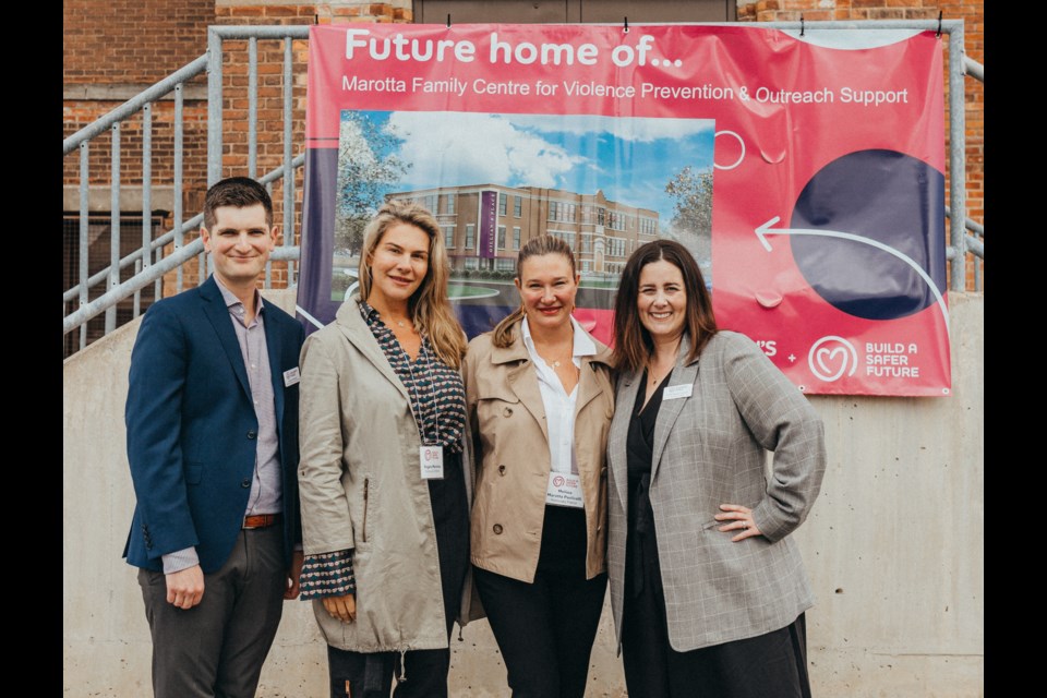 L-R: Graeme Dargavel, Angela Marotta, Melissa Marotta-Paolicelli and Gillian's Place executive director Nicole Regehr. in front of the future home of the Marotta Centre for Violence Prevention and Outreach Support.