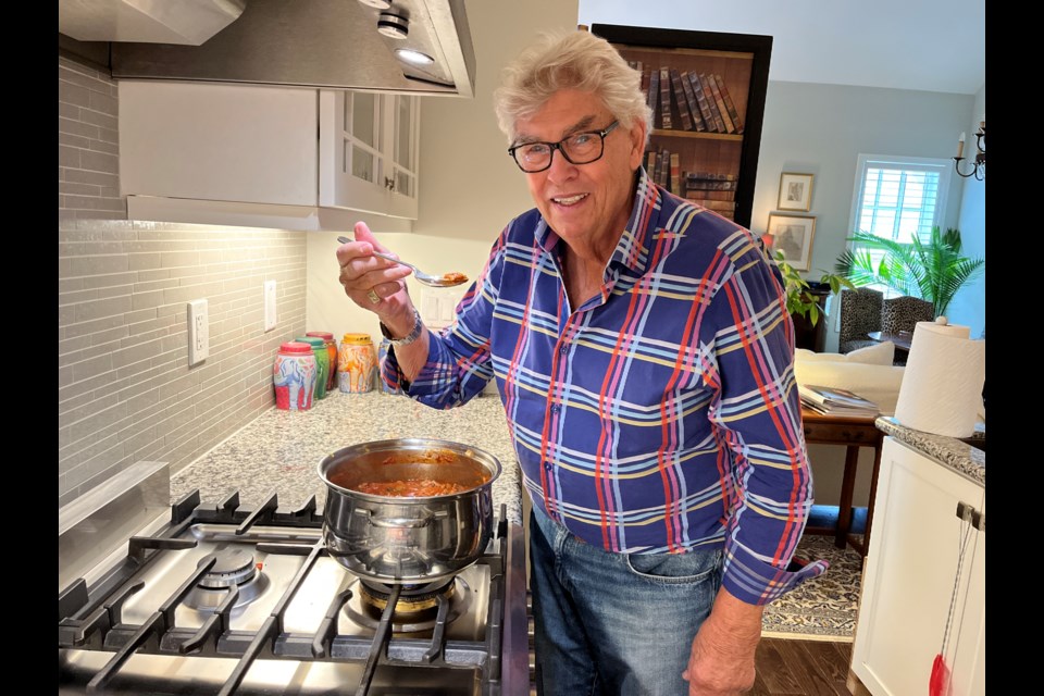 Nigel Napier-Andrews testing his Spaghetti Bolognese recipe in his NOTL kitchen. 