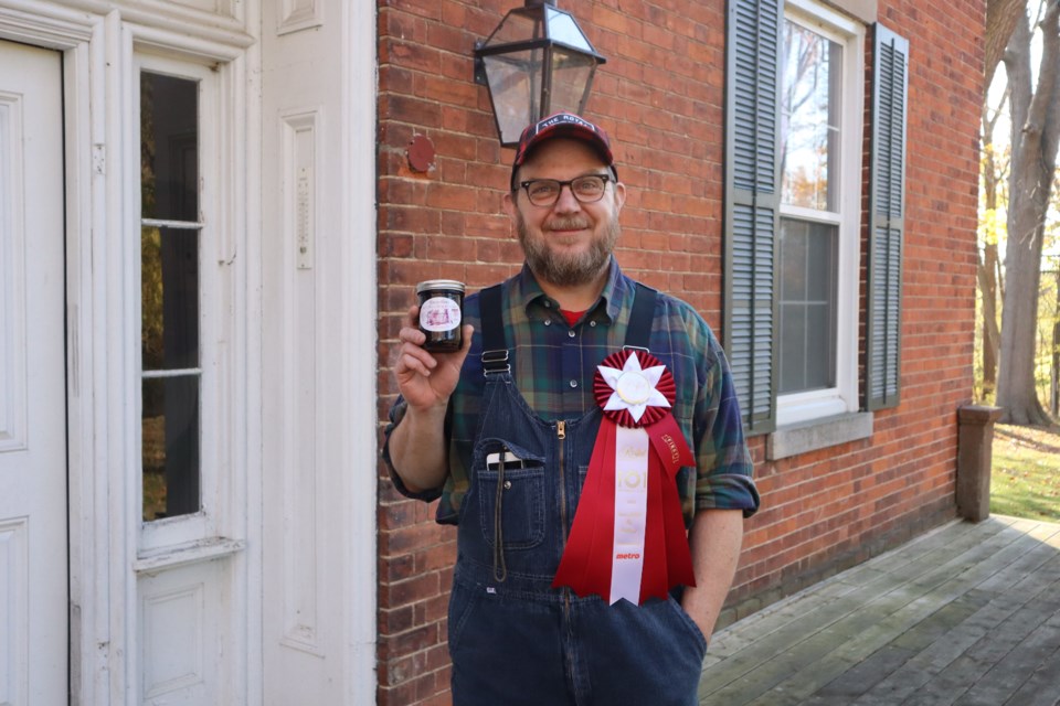 Andy Parks wears the ribbon he won with his Toad Hall seedless wild black raspberry jam at this month's Royal Winter Fair in Toronto.