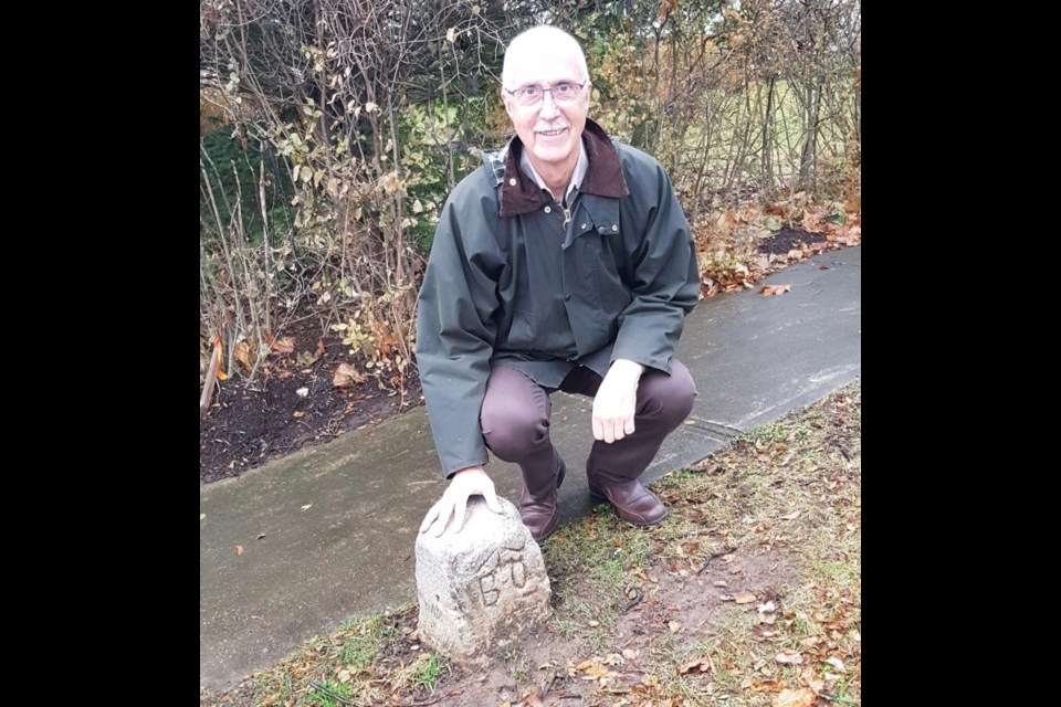 Ted Rumble discovered this ordinance stone across from his home, and then went on a hunt for information about its history. This one was cracked from being hit by a sidewalk snow plow, he says. | Penny Coles