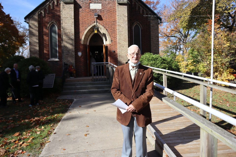 Parisioner Len Crombie leaves the church for the last time.