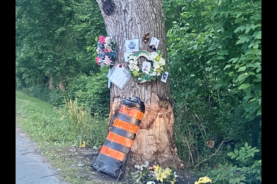 Memorial items have been put back on the tree by regional staff, since the tree is not going to be cut down until next week. | David Gilchrist