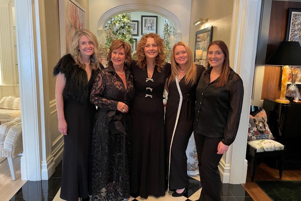 Hostess Brenda McArthur (second from left) personally welcomed guests to the Merry & Bright Christmas at the McArthur Estate during the Rotary Holiday House tours this weekend. She is pictured with her friends Emma Whyte (left), Krista, Janis and Abby.