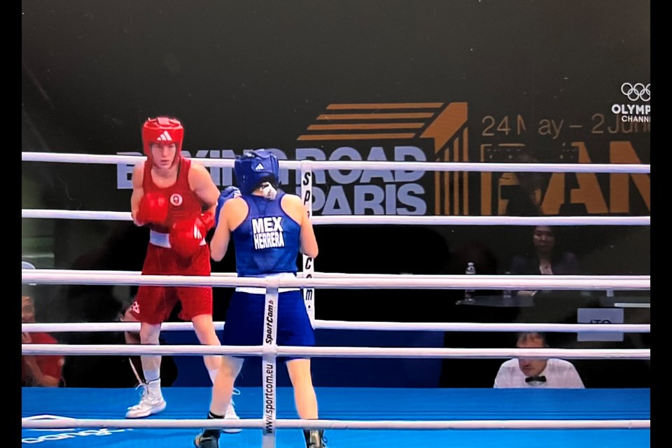 Mckenzie Wright (red) taking on Fatima Herrera at the final Olympic qualifier in Bangkok, Thailand, Sunday, June 2. 