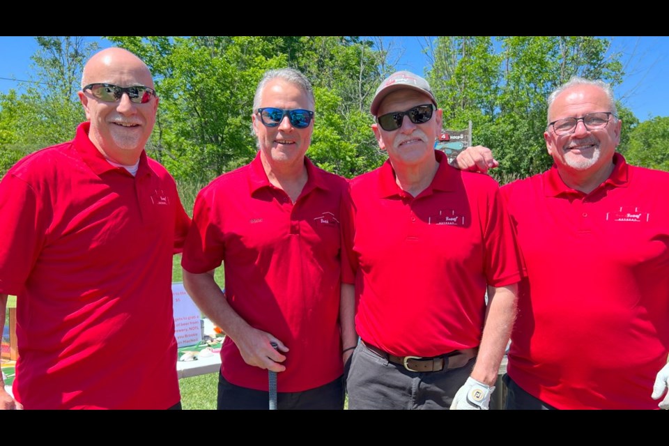 Doug Howse, Moe Bjorgan, Carl Fast and Brian Clemen at the 27th annual Moe's Golf Tournament for Red Roof Retreat. 