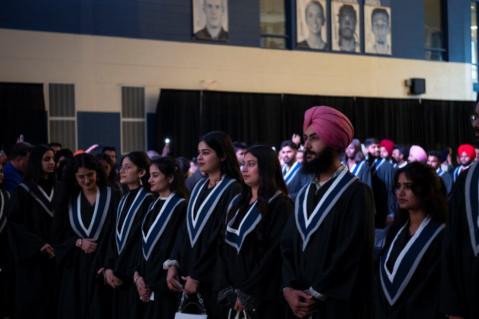 A group of Niagara College graduates at a Fall 2023 convocation ceremony.