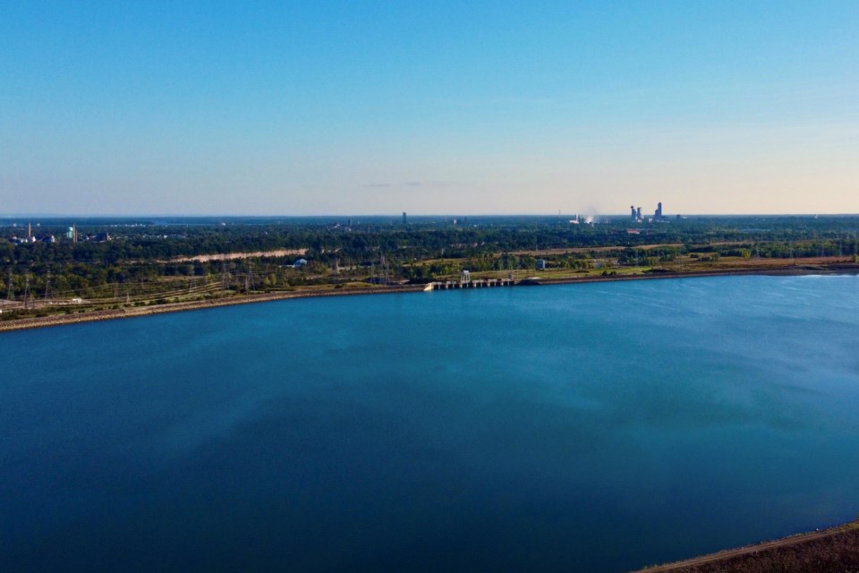 Owen Bjorgan's drone view looking south from Queenston, where the large reservoir and Niagara Falls skyscrapers' mist appear in the same shot. This is an international border where Dave Tebbutt was cautioned by authorities for flying his drone over the water.