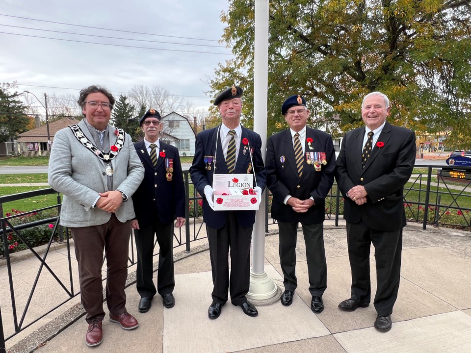 poppy flag raising