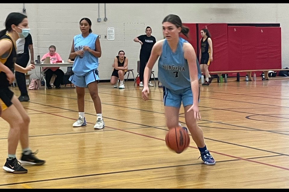 Rangers Kyla Pylypiw dribbles into the Toronto Lords zone while Mikayla Wallace follows up in support.