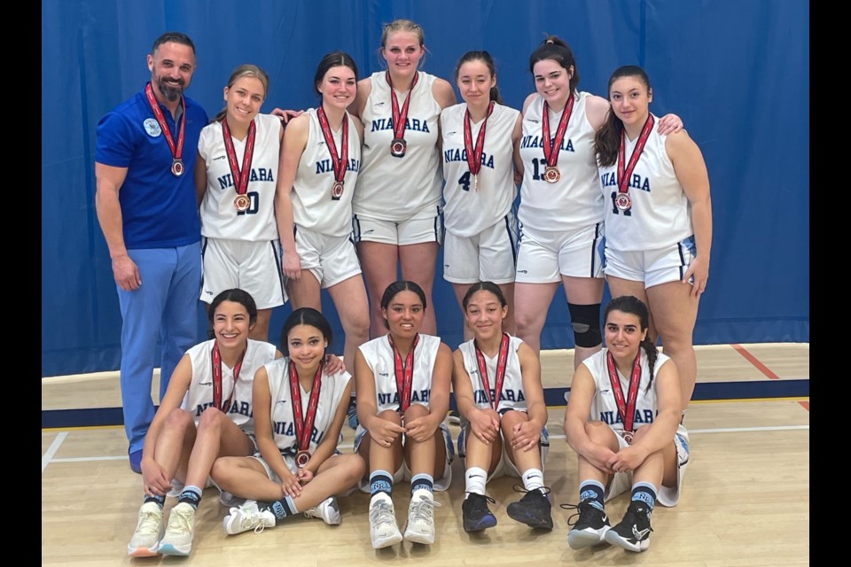 The Rangers team photo, with their medals: (back) Shawn Pylypiw (coach), Karlyn Coveney, Kyla Pylypiw, Ava Froese, Morgan Lambert, Amy Venneri, Emilia Ciocca; (front) Sydney Chavez, Jailah Gabbidon, Mikayla Wallace, Tiana Hicks, and Melia Kotsanis. Absent from the photo: Julia Diemer, Mikhaila Marshall.