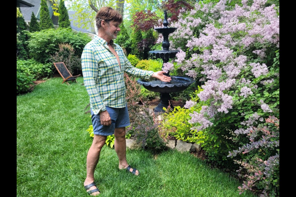 Joe Carlino explains the Centre Street garden is filled with lilac and hydrangea bushes for a bit of colour, with a variety of other perennials, shrubs and trees providing lots of texture.
