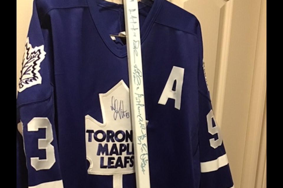A signed Maple Leaf jersey and stick are top items at the St. Mark's Haute Emporium.