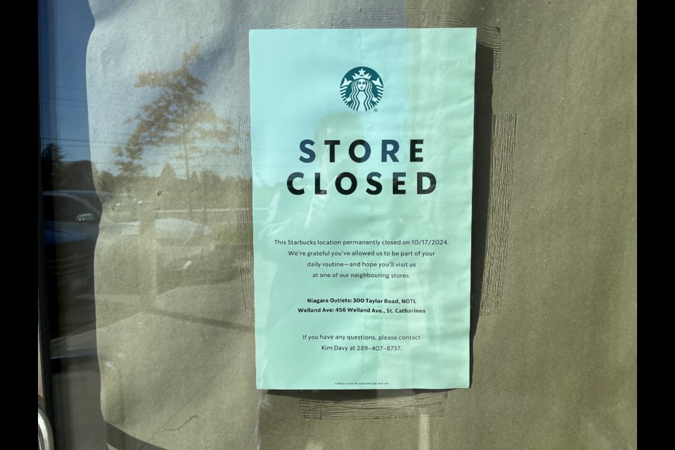 A sign on the door at the Starbucks at 1630 Niagara Stone Road explaining the closure.