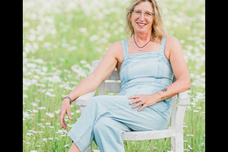 Steffanie Bjorgan, posing for promotional shots in the pasture at The Ranch.