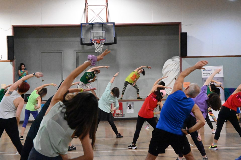 The Zumba class led by double lung transplant survivor Margaret Benson stretches it out at St. Catherine’s Church in North Vancouver Sunday afternoon. | Abby Luciano / North Shore News