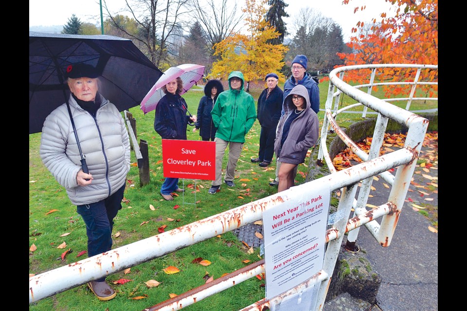 Robert Markson (left) and Niloufar Vahidmassoudi (r) join with other local residents concerned about proposed new Cloverley school affecting their neighbourhood and Cloverley Park. | Paul McGrath / North Shore News