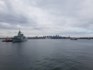 The HMCS Vancouver passes the SeaBus on its way to North Vancouver's Burrard Dry Dock Pier.