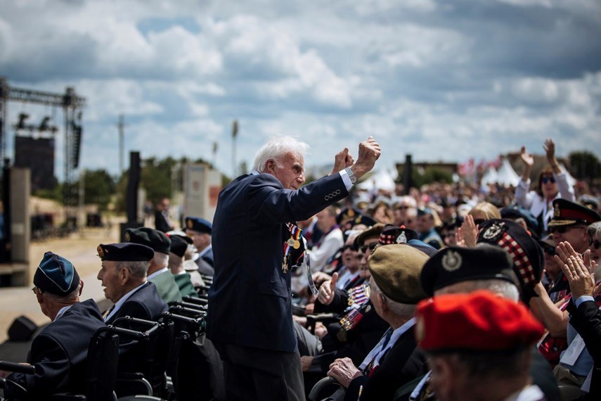 Sgt. Norman Kirby is acknowledged by the crowd at the 75th Anniversary of the D-Day invasion at Juno Beach, 2019.