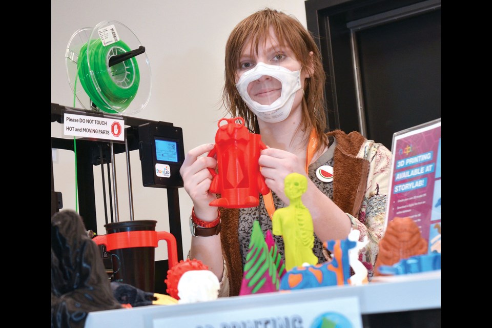 North Vancouver District Public Library creative technical advisor Nic Peerson gets crafty with the 3D printer now available for the public to use at the Lynn Valley branch. | Paul McGrath / North Shore News 