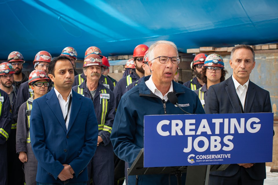 BC Conservative Leader John Rustad speaks at North Vancouver's Seaspan Shipyards on Thursday alongside local MLA candidates Sam Chandola for North Vancouver-Seymour and David Splett for North Vancouver-Lonsdale. | Nick Laba / North Shore News