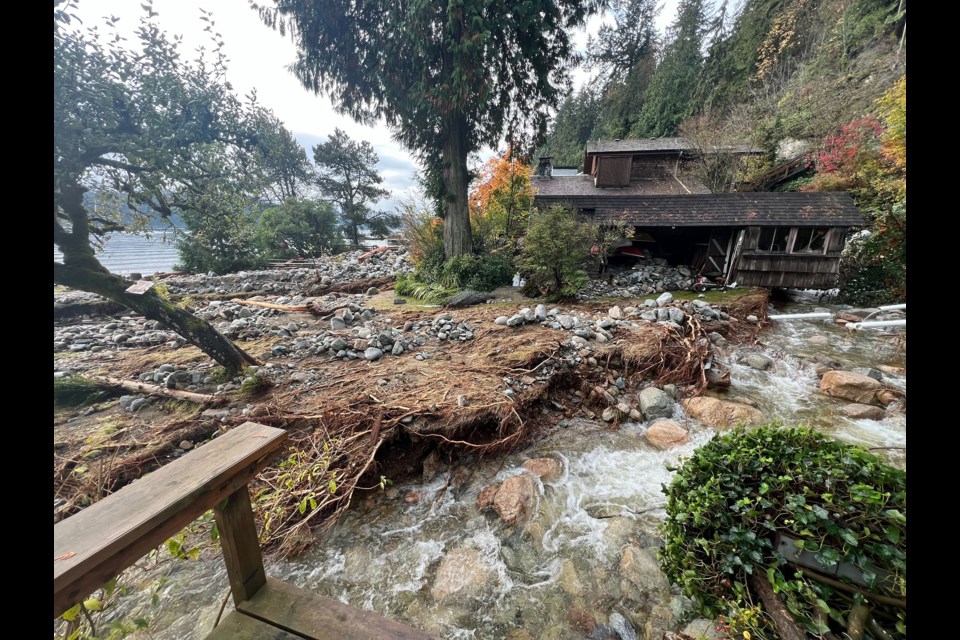 Debris flushed down during the atmospheric river storm of Oct. 18-20 sits strewn about near several Deep Cove properties. An evacuation order was issued for three homes Oct. 26 due to more debris falling from clogged creek systems above. | photo supplied