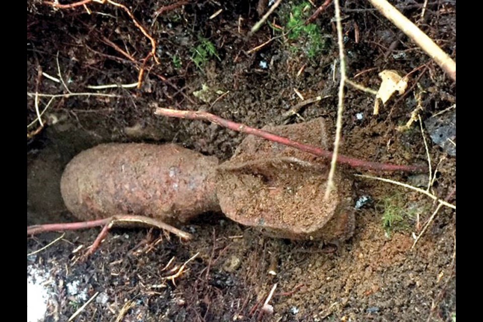 A three-inch mortar is unearthed at the Blair Rifle Range lands in North Vancouver in February 2018. | Department of Defence 