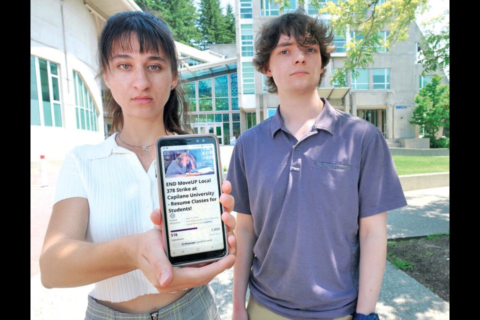 Capilano University students Katerina Derbas (left) and Layne North have been frustrated at how a strike by support workers at CapU has impacted classes. Students will head back to class on July 4.| Paul McGrath / North Shore News 