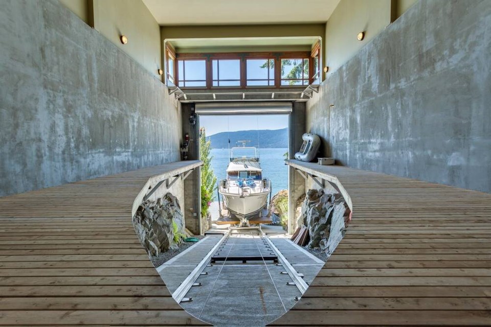 A unique ‘boat garage’ is a feature of a waterfront estate that was listed for sale at $26.9 million in West Vancouver in 2024. Stories about 'luxury' real estate often garner a lot of online attention at nsnews.com. | Eric Latta 