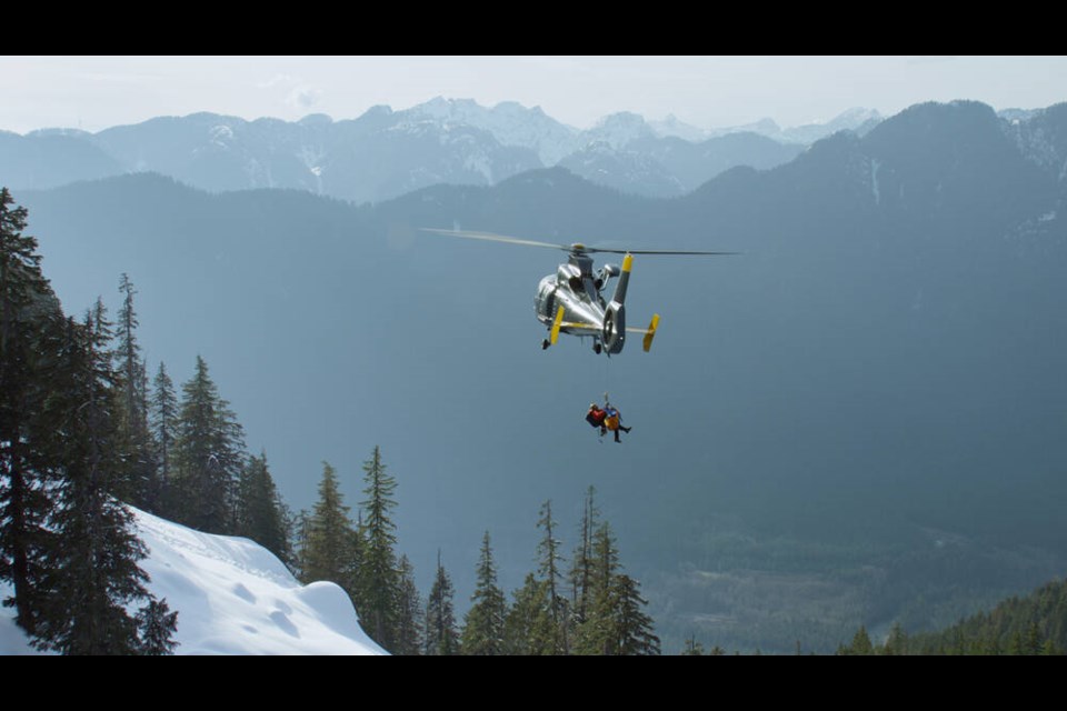 A Talon Helicopter transports North Shore Rescue volunteers out of the backcountry, captured as part of the Knowledge Network’s new season of 'Search and Rescue: North Shore.' | Courtesy of Silvapark Films. 