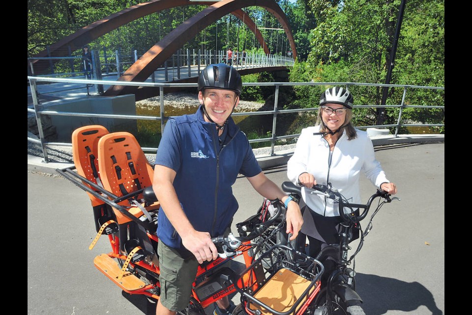 District of North Vancouver Couns. Jordan Back and Catherine Pope at Bridgman Park on the Spirit Trail. Both councillors are advocating that work to extend the multi-use trail eastward should proceed without further delay. | Paul McGrath / North Shore News 