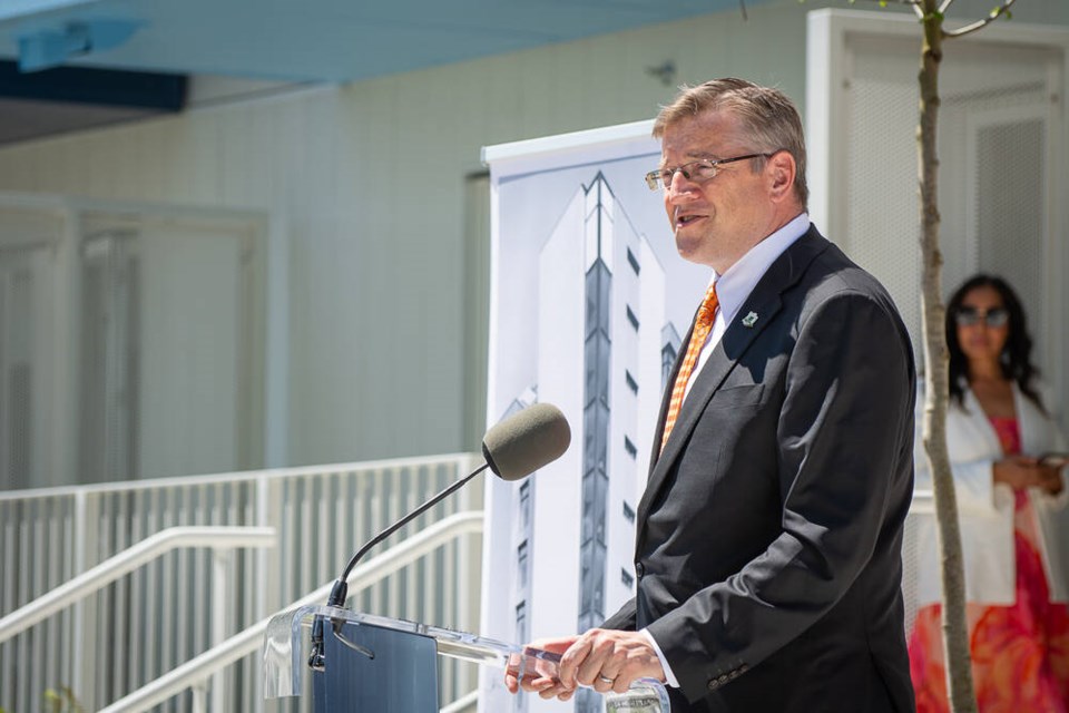 District of North Vancouver Mayor Mike Little speaks at a press event on Wednesday in front of the new affordable apartment building at 267 Orwell St. | Nick Laba / North Shore News 