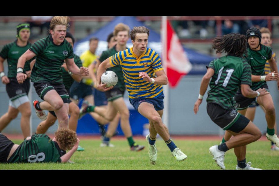 Collingwood's James Holm finds running room duirng the provincial AA championship tournament. Holm scored three tries in the provincial final to earn tournament MVP honours. | Blair Shier 