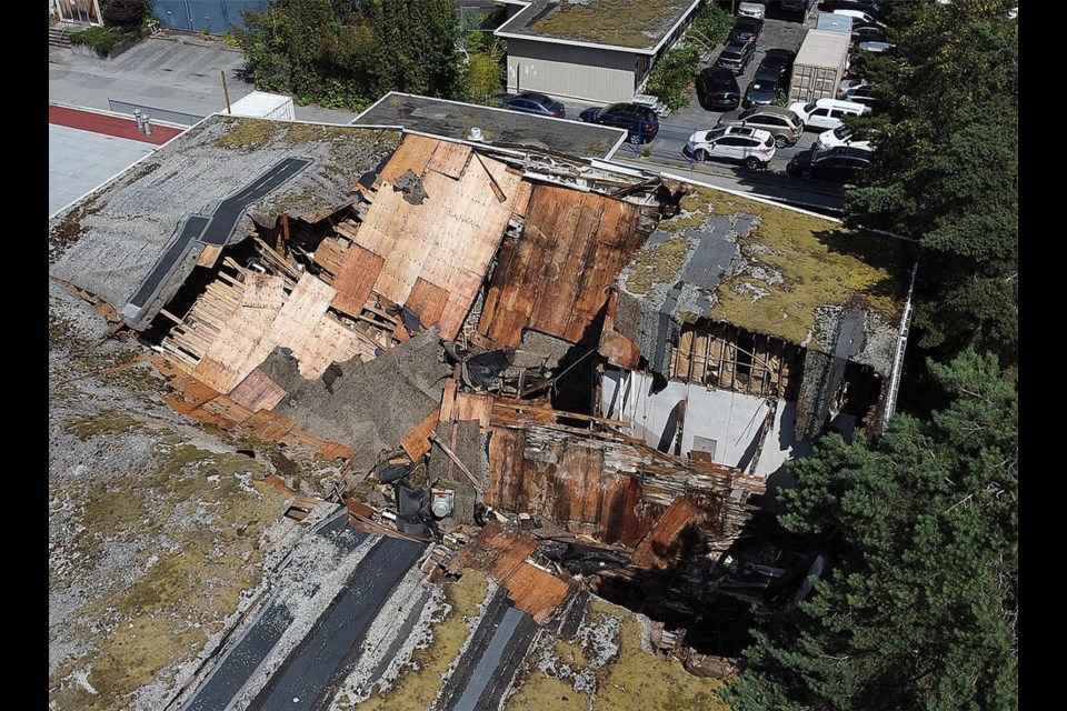 An overhead image captured by a drone shows the damage done to the North Vancouver school district’s Lucas Centre property after the gym roof collapsed, June 25, 2024. | Paul McGrath / North Shore News 