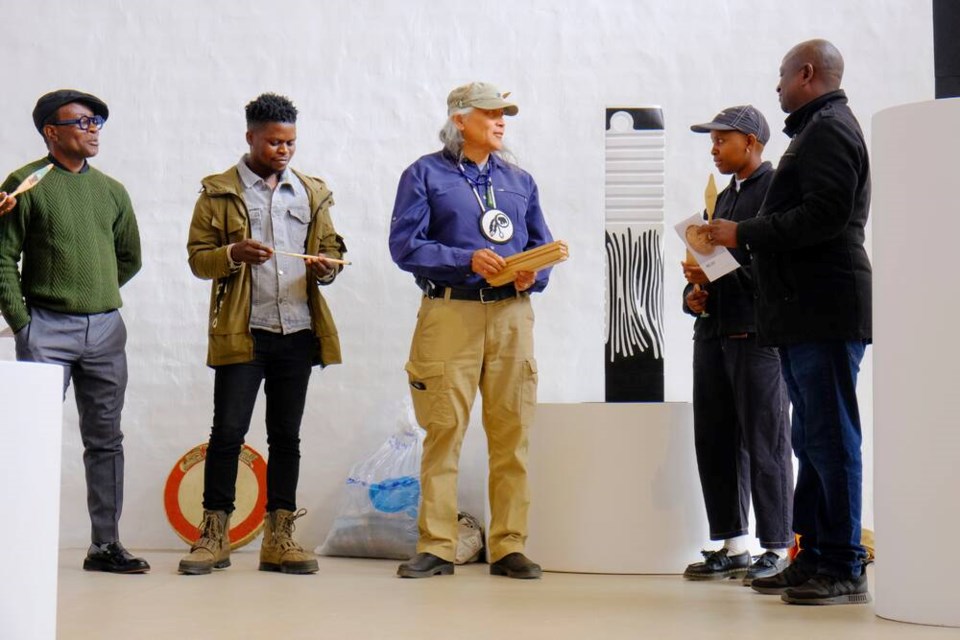 Xwalactun leads an address and gifting at the opening of the group show Relief at NIROX Sculpture Park in Krugersdorp, South Africa in June. | Ntate Phakela. 