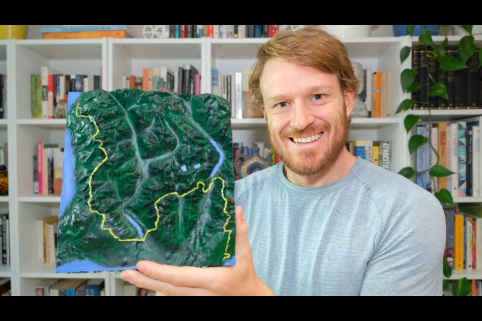 Alexander Mark Weber shows off his memento from his 80-kilometre run from Deep Cove in North Vancouver to Porteau Cove: a 3D-printed map marking his route. | courtesy Alexander Mark Weber 