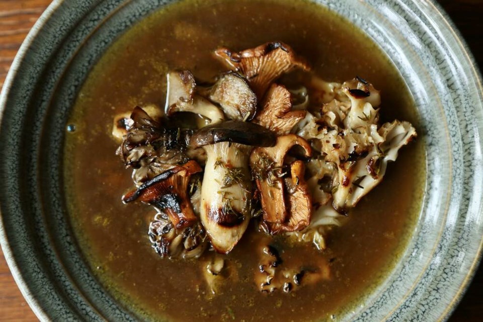 A fall feast of grilled foraged and specialty mushrooms nestles in collagen-rich bison bone broth. | Laura Marie Neubert 