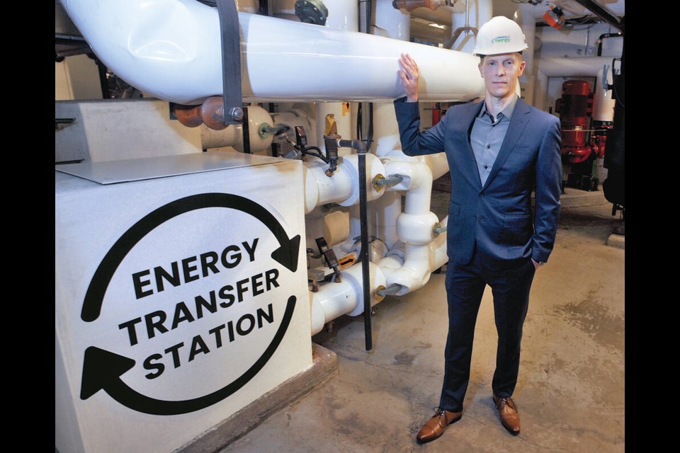 Lonsdale Energy Corp. CEO Karsten Veng checks out one of the existing LEC heat transfer stations inside North Vancouver’s Pinnacle Hotel. The public utility will soon be capturing heat from raw sewage and reusing it to warm homes and businesses. | Paul McGrath / North Shore News 