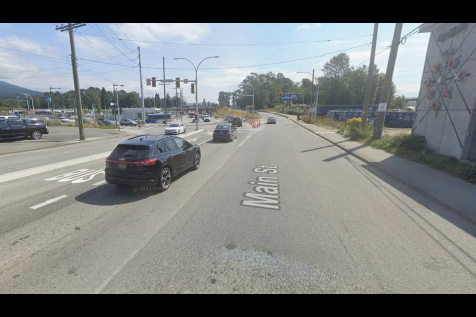 Currently, a lane takes local traffic eastbound on Main Street. The proposed change would have that lane be shared with traffic heading to Highway 1 via the onramp. | Google Earth 