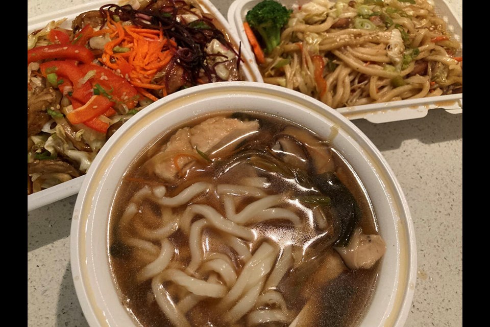 Chicken Yaki Udon dishes from North Vancouver’s Hachi Hanna (top left) and Sushi Umi battle against Chicken Udon Soup from Sushi Kumo in this takeout udon duel. | Andy Prest / North Shore News 