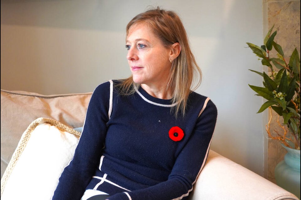 Assunta Aquino, a Canadian Forces veteran who worked to clear minefields in Bosnia, reflects in her North Vancouver home. | Brent Richter / North Shore News 