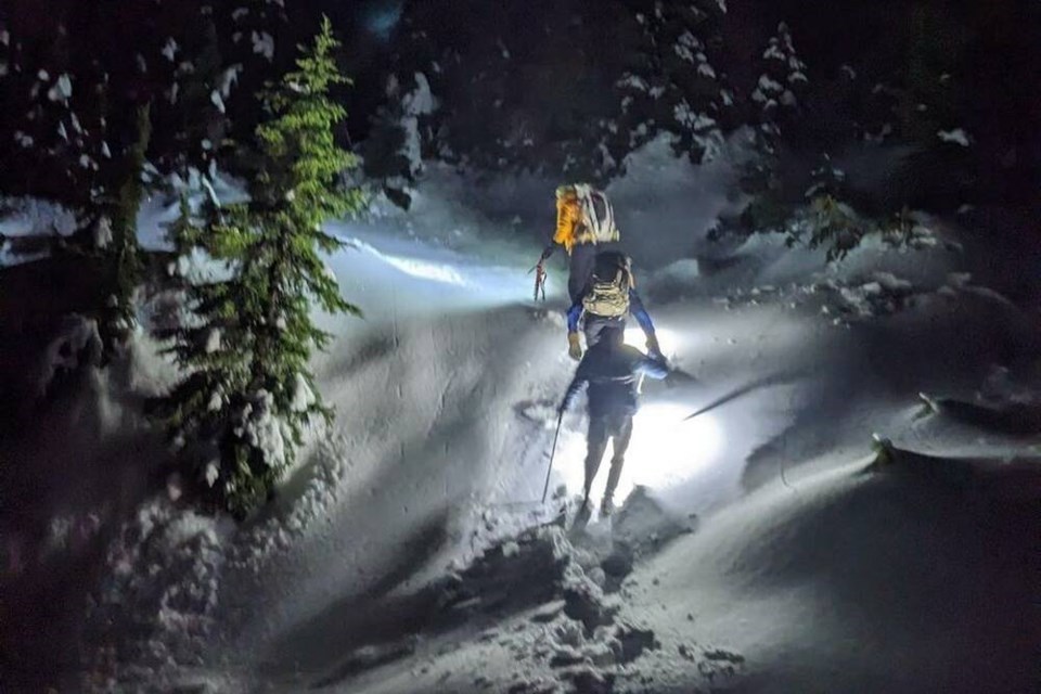 North Shore Rescue volunteers hike into Goat Ridge on Sunday evening. | North Shore Rescue 