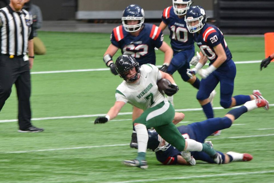 Windsor’s Samson Sachter rushes the ball in Saturday’s final against Vernon at BC Place. | Kristy Baker 