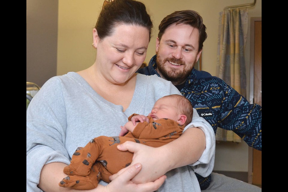 Kendra Williams and Sean Brown, both 32 years old, at Lions Gate Hospital with their baby boy Remy, the first baby of 2025 born on the North Shore. | Paul McGrath / North Shore News 