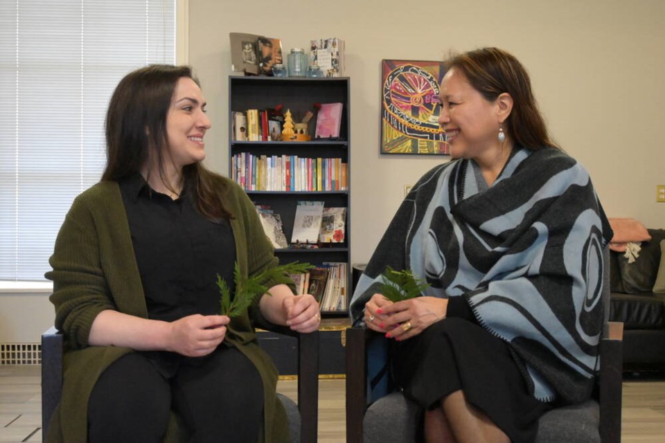 Golnaz Yazdi, safety and justice programs co-ordinator at the North Shore Women's Centre, prepares to host healing circle sessions with Palnata7 (Robbi Wilson), one of the Indigenous wellness consultants for the sessions. | Abby Luciano / North Shore News 