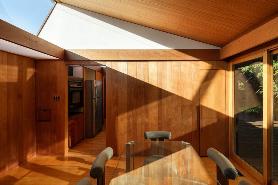 Light from an angled skylight shines into the home at 3526 Everglade Place in North Vancouver. | West Coast Modern / The Whitespace Co. 