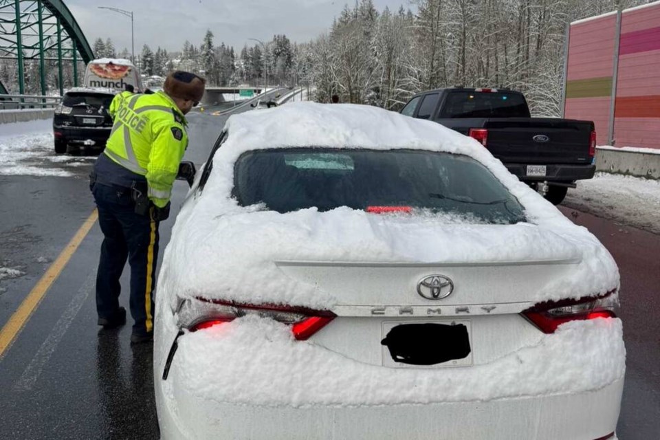 North Vancouver RCMP stopped around 45 vehicles Tuesday afternoon. Several didn’t even have a brush to take the snow off their car. | North Vancouver RCMP 