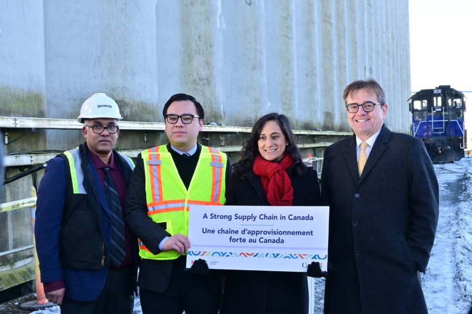 Devendra Maharaj (left), Wilson Miao, Anita Anand and Jonathan Wilkinson stand beside Richardson International Wednesday announcing millions being invested in infrastructure projects across Western Canada. | Abby Luciano / North Shore ߣ 