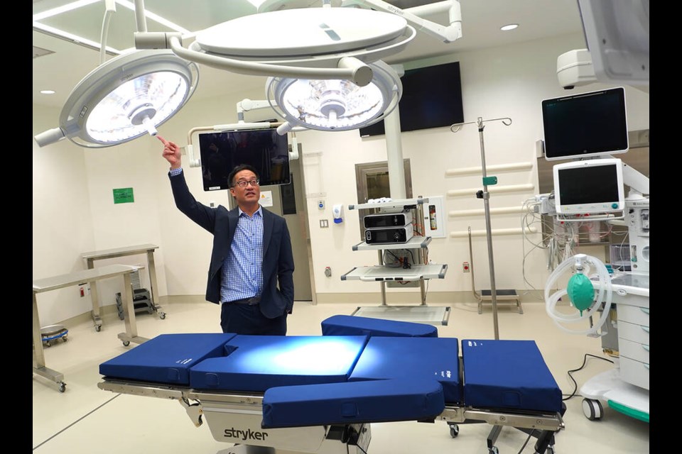 Lions Gate Hospital urologist Dr. Victor Chow shows off one of eight new operating rooms at the Paul Myers Tower, Feb 12, 2025. | Brent Richter / North Shore News 