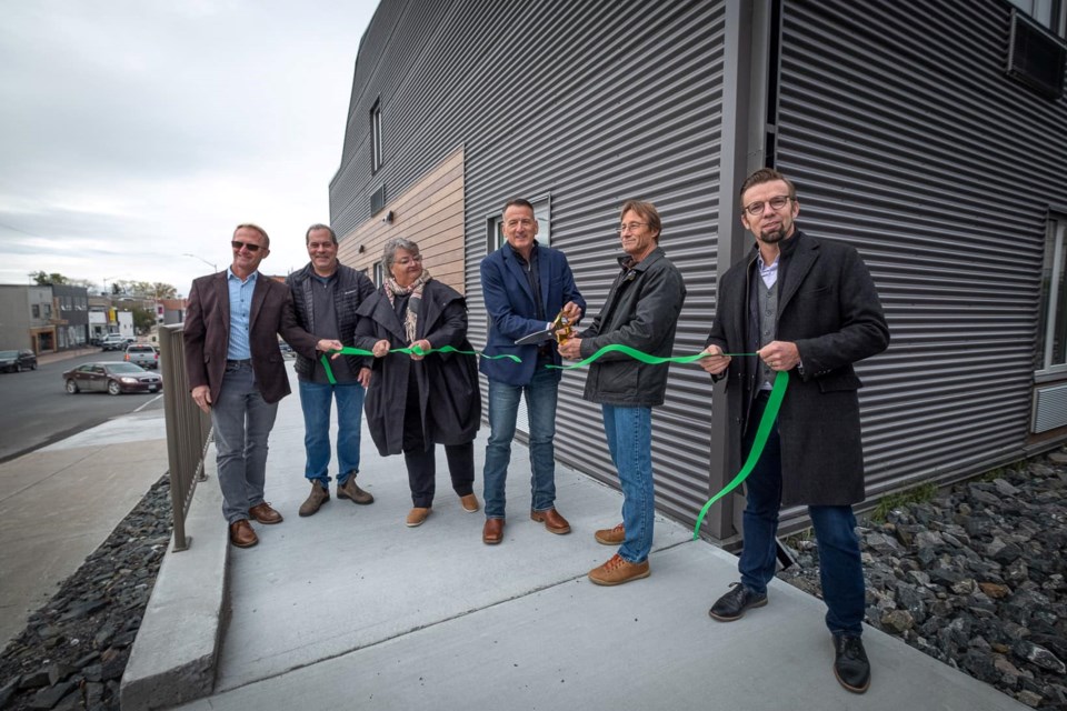 A ceremonial ribbon cutting was held Tuesday for 20 new affordable housing units in Kenora.