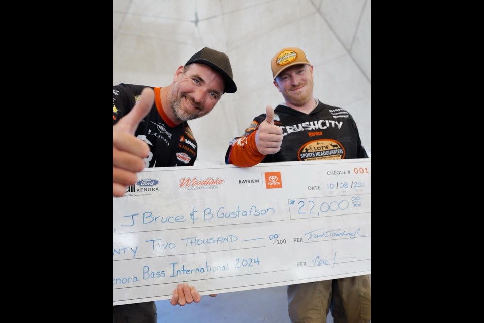 Jamie Bruce, left, and Bryan Gustafson were all smiles after winning the Kenora Bass International on Aug. 10. 